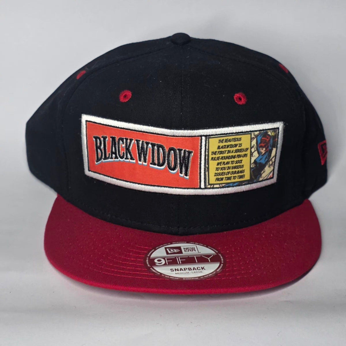 New Era black and red snapback cap with Black Widow patch and Marvel logo.