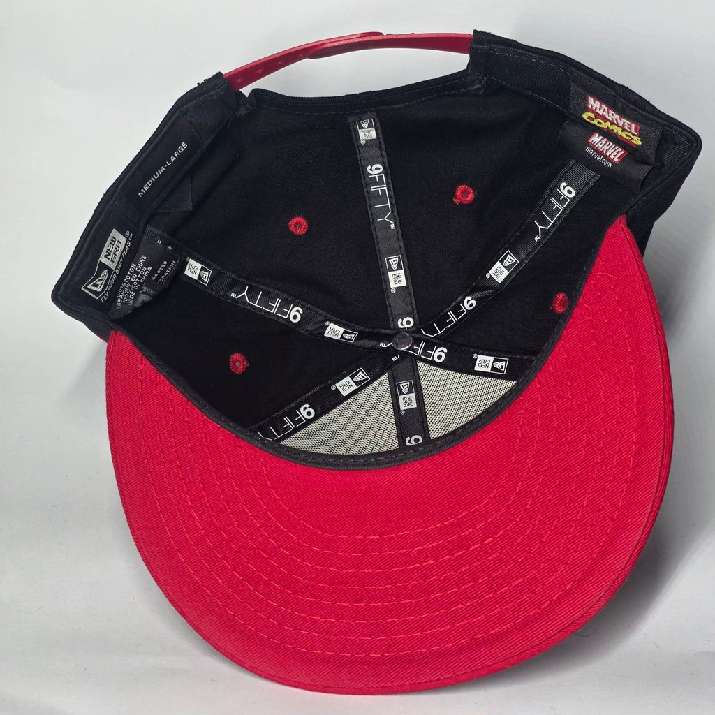 New Era black and red snapback cap with Black Widow patch and Marvel logo.