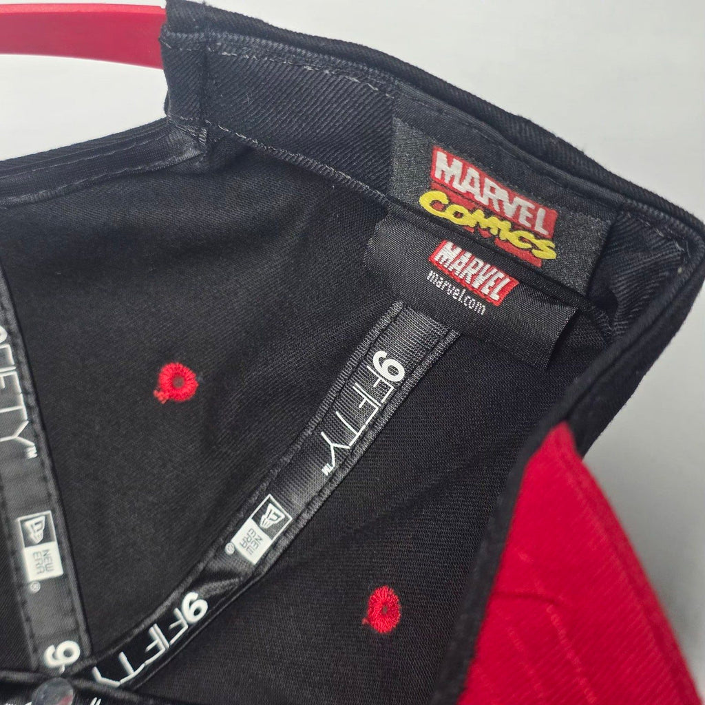 New Era black and red snapback cap with Black Widow patch and Marvel logo.